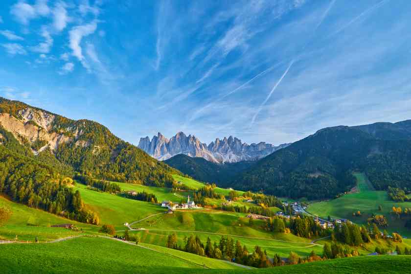 Amazing-autumn-scenery-santa-maddalena-village-with-church-colorful-trees-meadows-rising-sun-rays-dolomite-alps-italy - travel and tour world