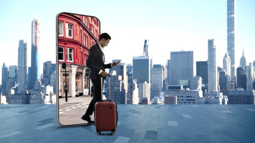 Asian-business-man-walking-from-mobile-phone - travel and tour world