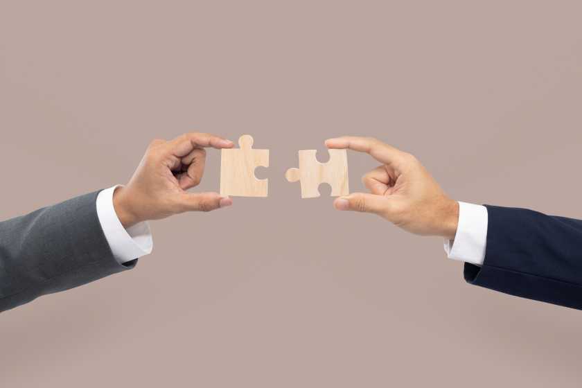 Hands-holding-puzzle-business-problem-solving-concept - travel and tour world