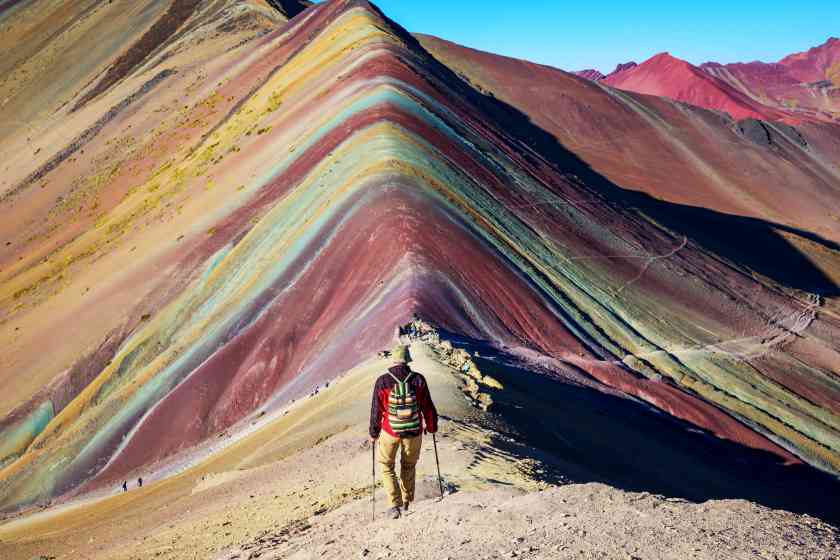 Hiking-scene-vinicunca-cusco-region-peru-montana-de-siete-colores-rainbow-mountain - travel and tour world