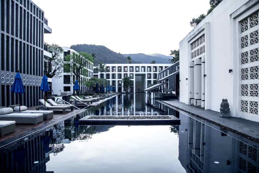 Hotel-with-swimming-pool - travel and tour world