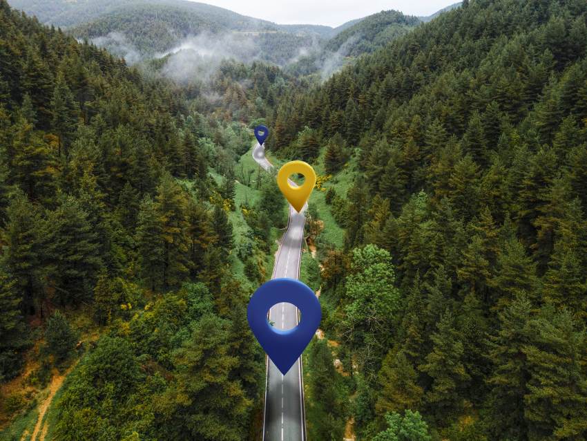 Location-symbols-road-with-mountains - travel and tour world