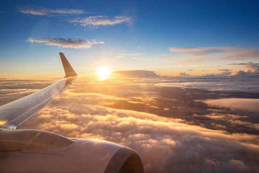 Sunset-sky-airplane-window-copenhagen-denmark-friday - travel and tour world
