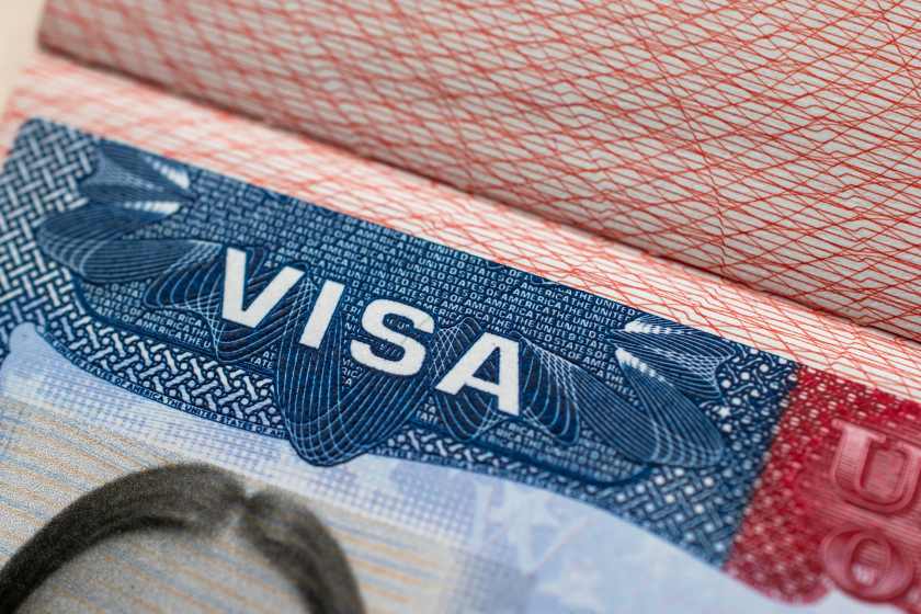 Us-visa-stamp-travel-passport-united-states-america-immigrant-work-travel-documents - travel and tour world