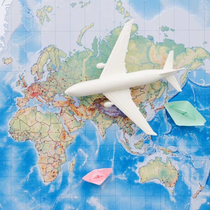 White-toy-plane-map - travel and tour world
