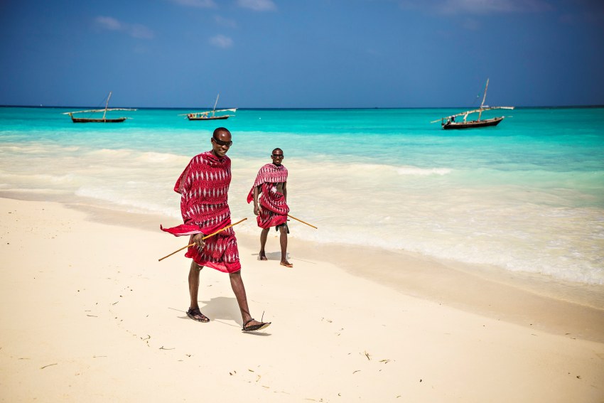 African-masai-man-traditionally-dressed-beach-nungwi-village-zanzibar-tanzania - travel and tour world
