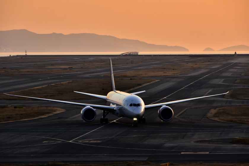 Airplane-runway-sunset - travel and tour world