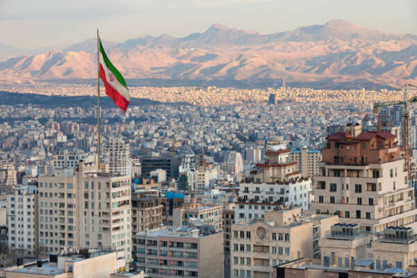 It is waving Iran's flag over the Tehran horizon at sunset - travel and a world tour Japan's travel