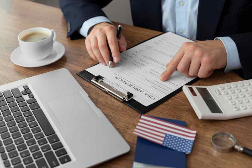 Visa-application-composition-with-american-flag - travel and tour world