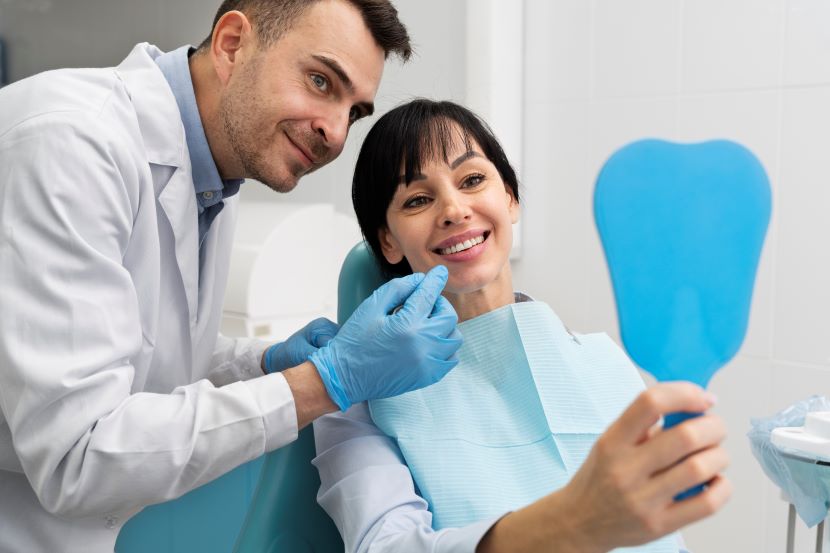 Smiling patient showcasing a dental transformation after cosmetic dentistry procedure in morocco, highlighting dental tourism.