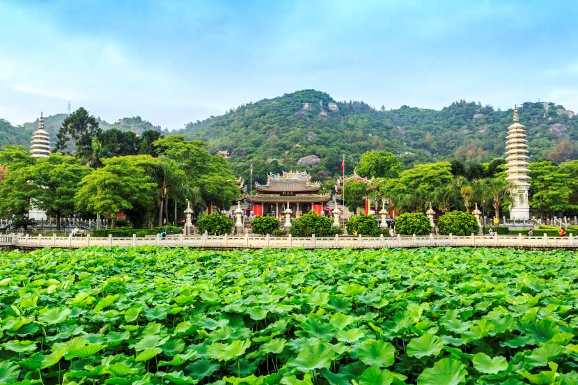 Scenic view of hoa lu ancient capital in ninh binh, vietnam, showcasing historical temples and limestone peaks, highlighting the region&rsquo;s rich cultural heritage and tourism appeal.