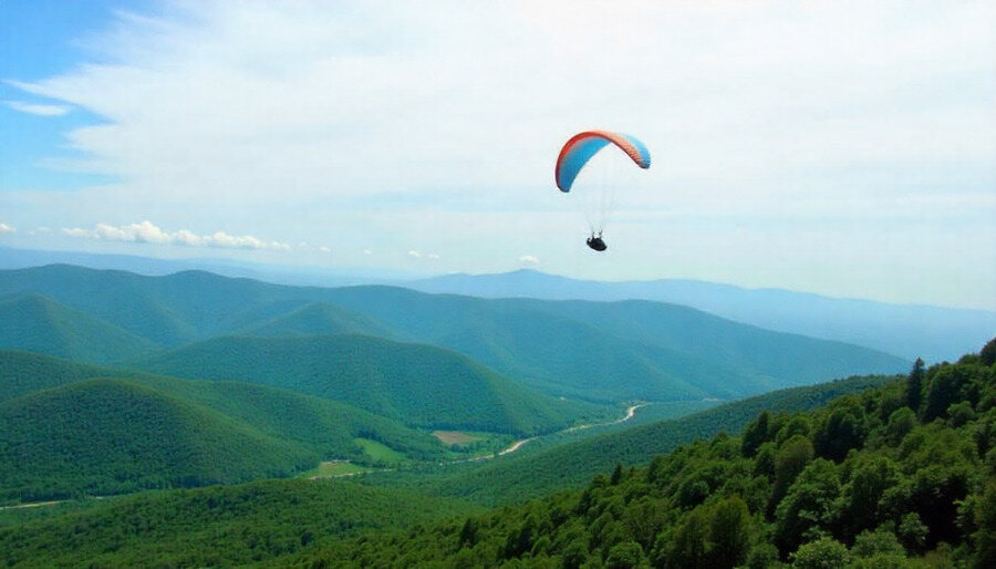 Fly High In Meghalaya With Paragliding Offering Tourists An Unparalleled View Of The State’s Lush Valleys, Misty Hills And Pristine Lakes