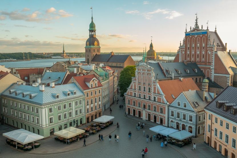 France unites with spain malta latvia finland and more europes 2025 tourism boom set to conquer the world - travel and tour world A scenic view of a bustling european city square, with tourists from different nationalities walking around, shopping, and taking pictures. Iconic landmarks such as the eiffel tower in paris, the colosseum in rome, or barcelona's Sagrada Familia should be visible in the distance. The atmosphere should reflect Europe’s thriving tourism industry in 2025, highlighting the diverse international visitors and vibrant cultural experiences. Make sure to capture sunshine, active crowds, and a welcoming European ambiance.