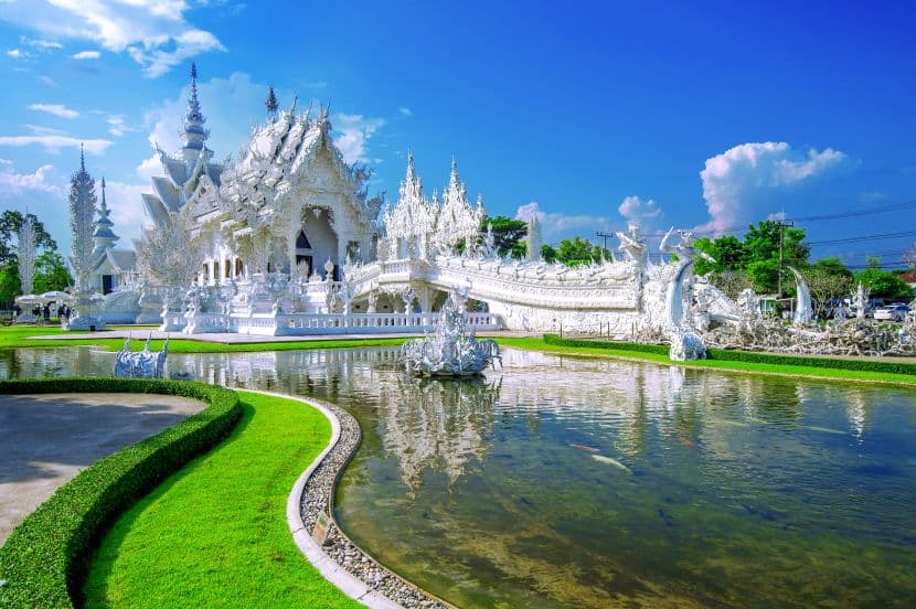 White temple in chiang rai, thailand - travel and tour world Stunning white temple in chiang rai, thailand, a top tourist attraction.