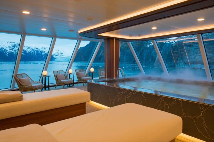 Luxury cruise ship spa with panoramic ocean views and modern amenities. - travel and tour world Luxury cruise spa with ocean views and wellness facilities.