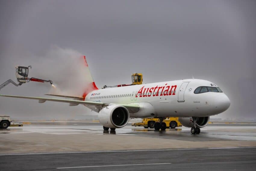 Austrian airlines aircraft being cleaned at the airport.