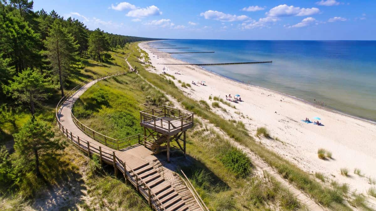 Lithuania teams up with latvia, estonia, poland, and germany to showcase the baltic coast as europe&rsquo;s peaceful beach escape with unesco landscapes, blue flag shores, coastal culture, and nature-focused travel experiences