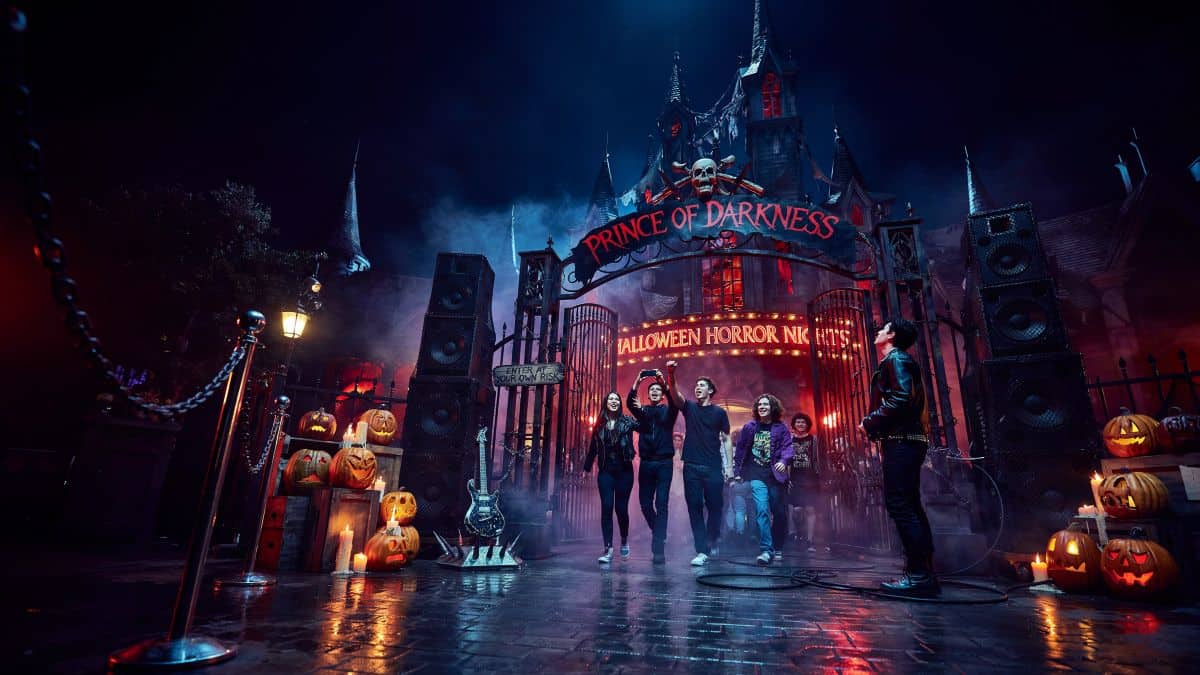 Visitors entering an ozzy osbourne themed haunted house during universal studios halloween horror nights in the usa