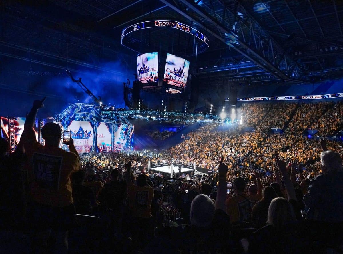 Wwe- australia - travel and tour world International visitors attending a major wrestling event at an indoor arena in perth, australia.