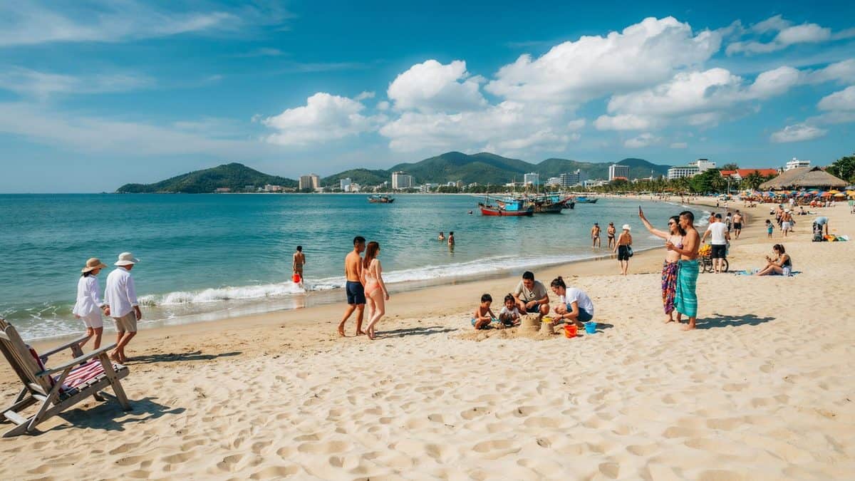 People relaxing on sandy beach