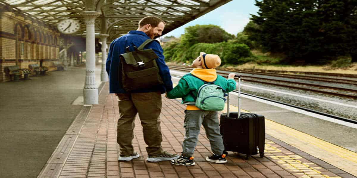 Irish rail station platform with passengers preparing for a train journey in ireland