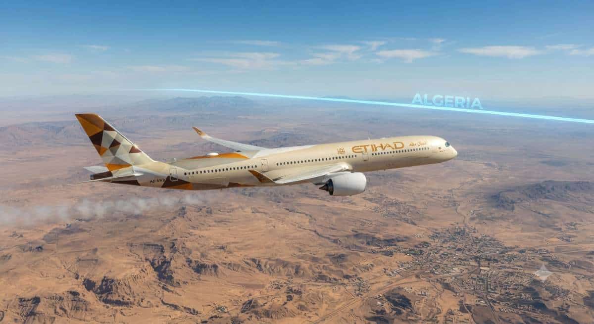 Commercial airliner flying near algeria airspace boundary representing regional aviation adjustments following political developments.