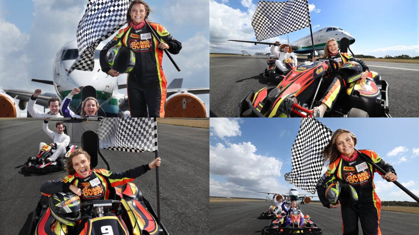 Brisbane airport skygate game over electric go-kart attraction with racers and aircraft background