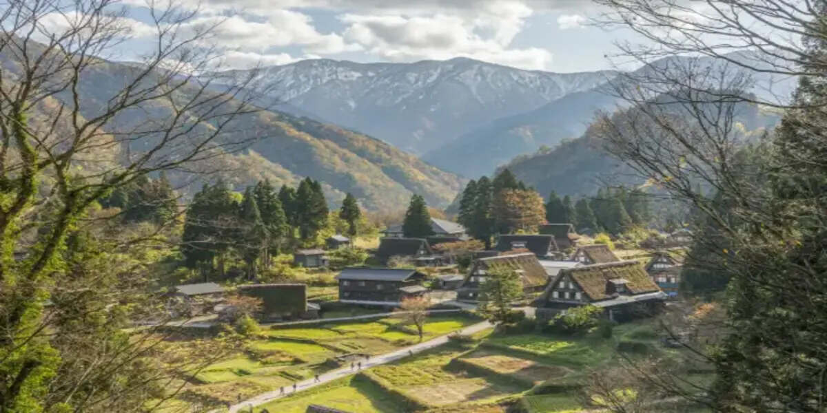 Traditional japanese village in tohoku with mountain landscape and autumn scenery