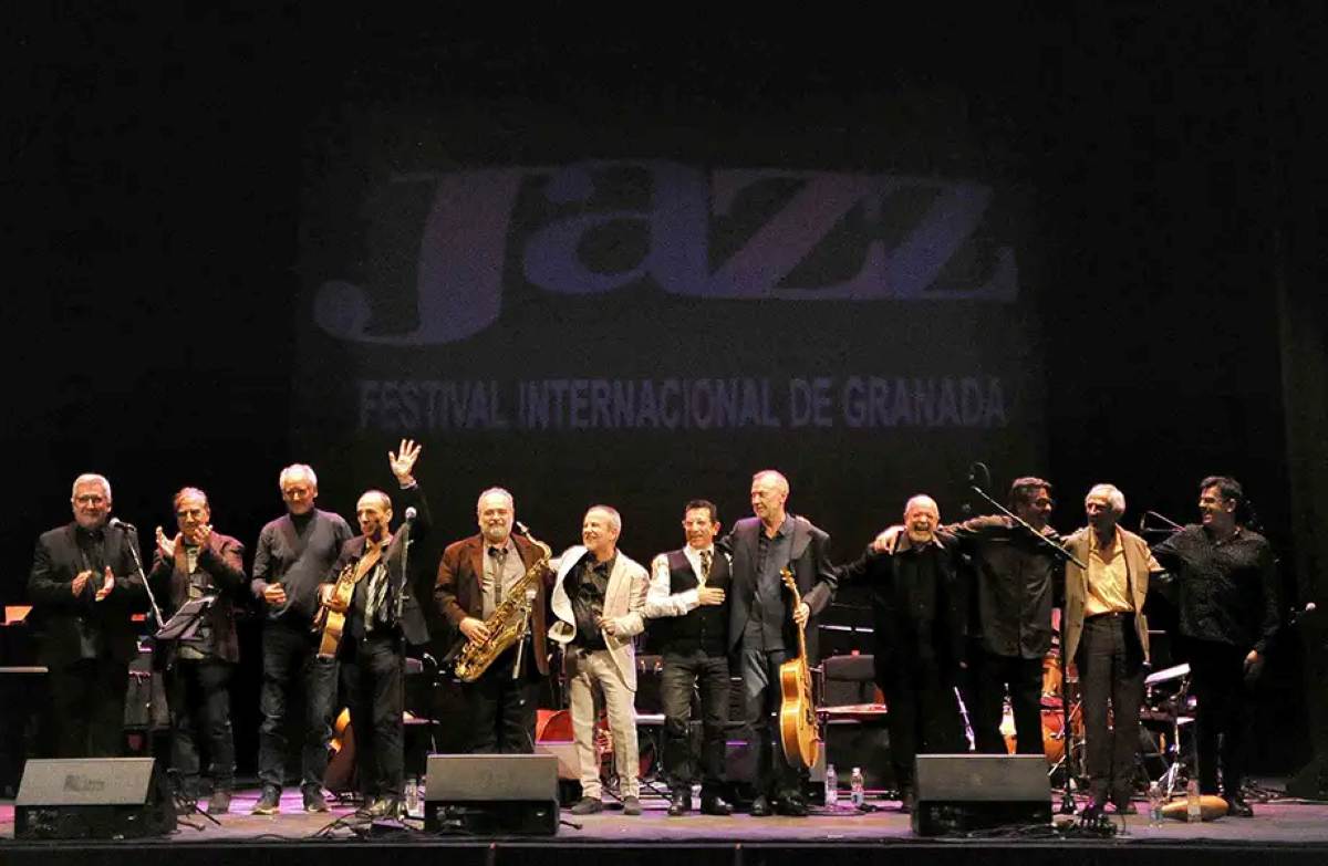 Jazz - travel and tour world An atmospheric view of historic granada streets illuminated at dusk during the granada international jazz festival in andalusia.