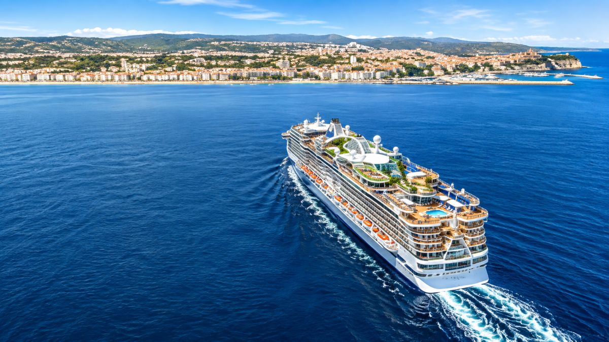Luxury caribbean resort and cruise ship representing closer links between cruise and land-based tourism
