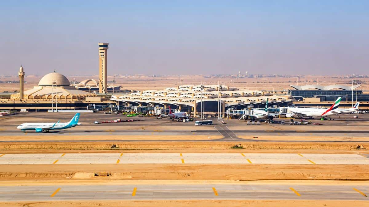 Riyadh skyline near king khalid international airport representing regional aviation disruption and saudi arabia&rsquo;s tourism challenges.