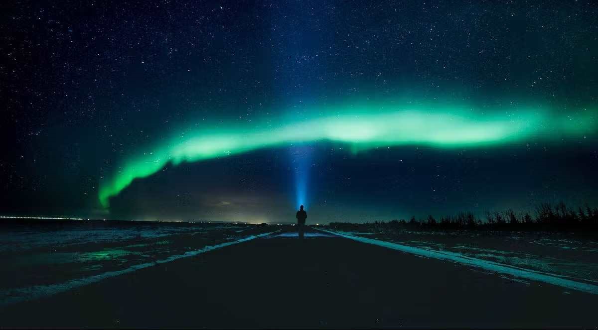 Northern lights glow over norway during an autumn aurora