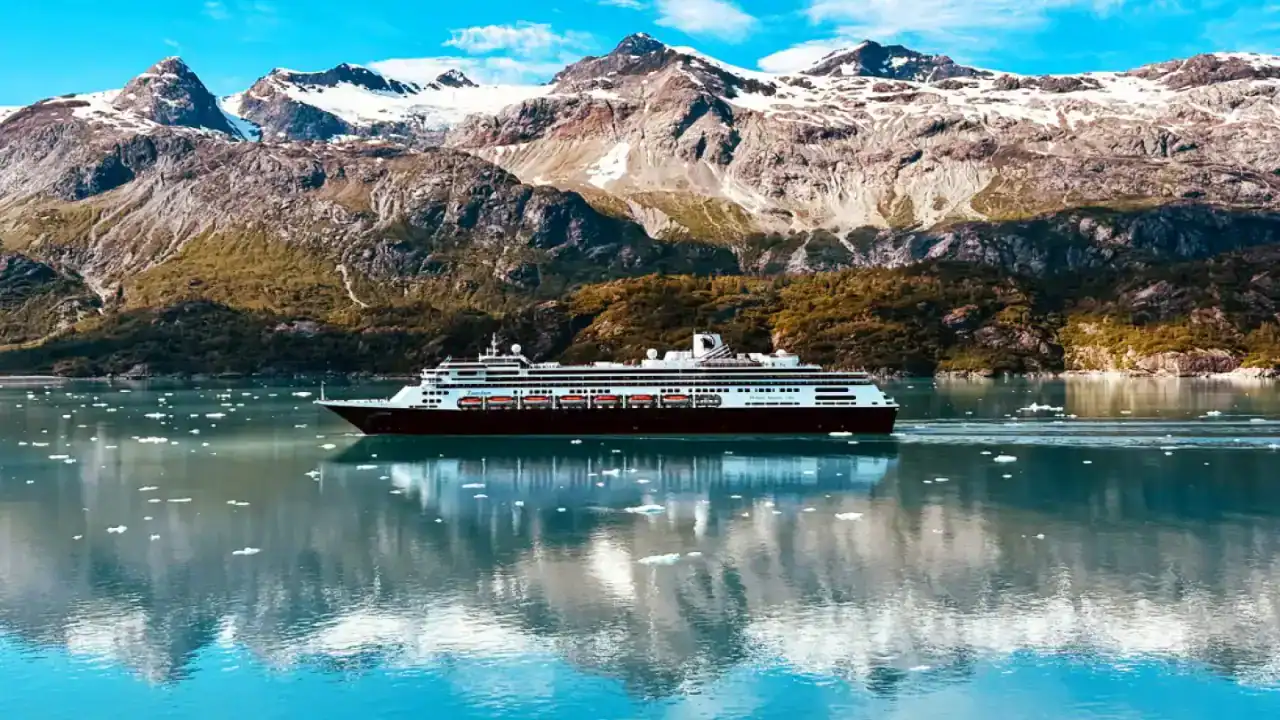 Holland america line zaandam cruise ship sailing through alaska waters during great bear rainforest and alaska explorer voyage