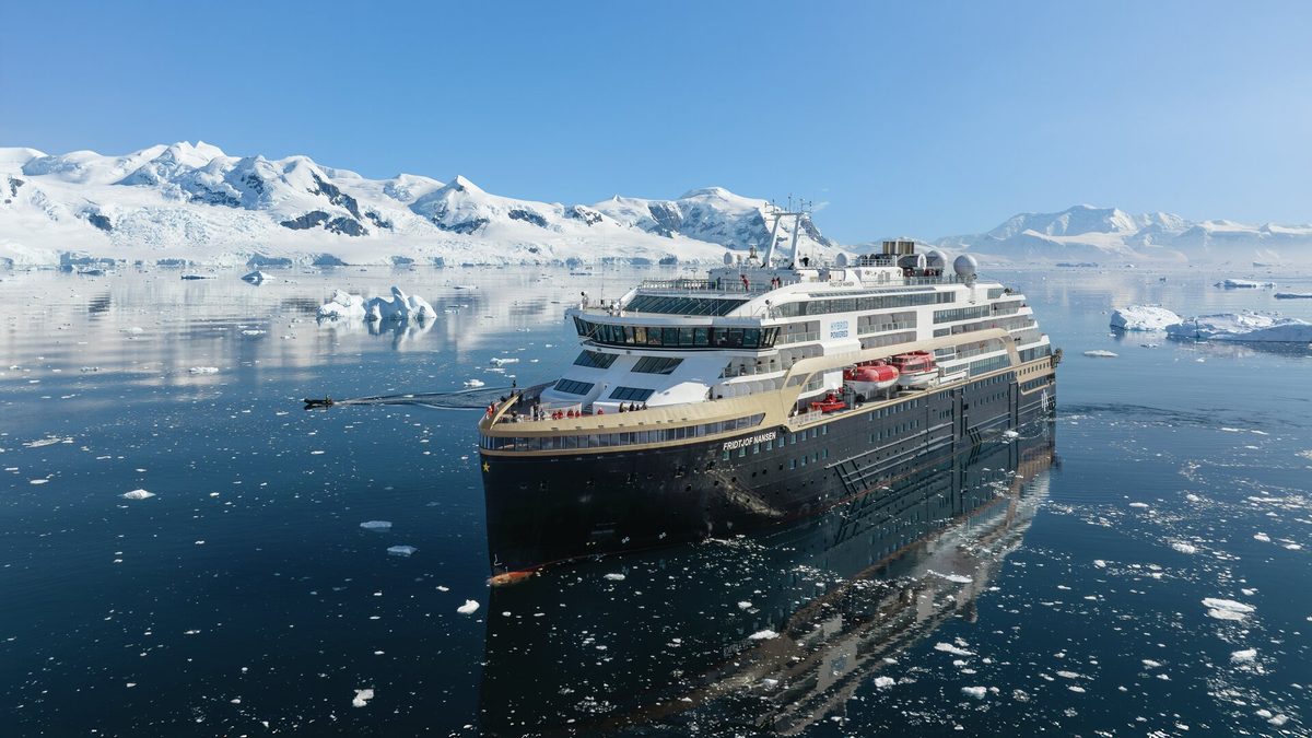 Hx expeditions expedition ship sailing through arctic waters with upgraded onboard services and luxury cruise experience
