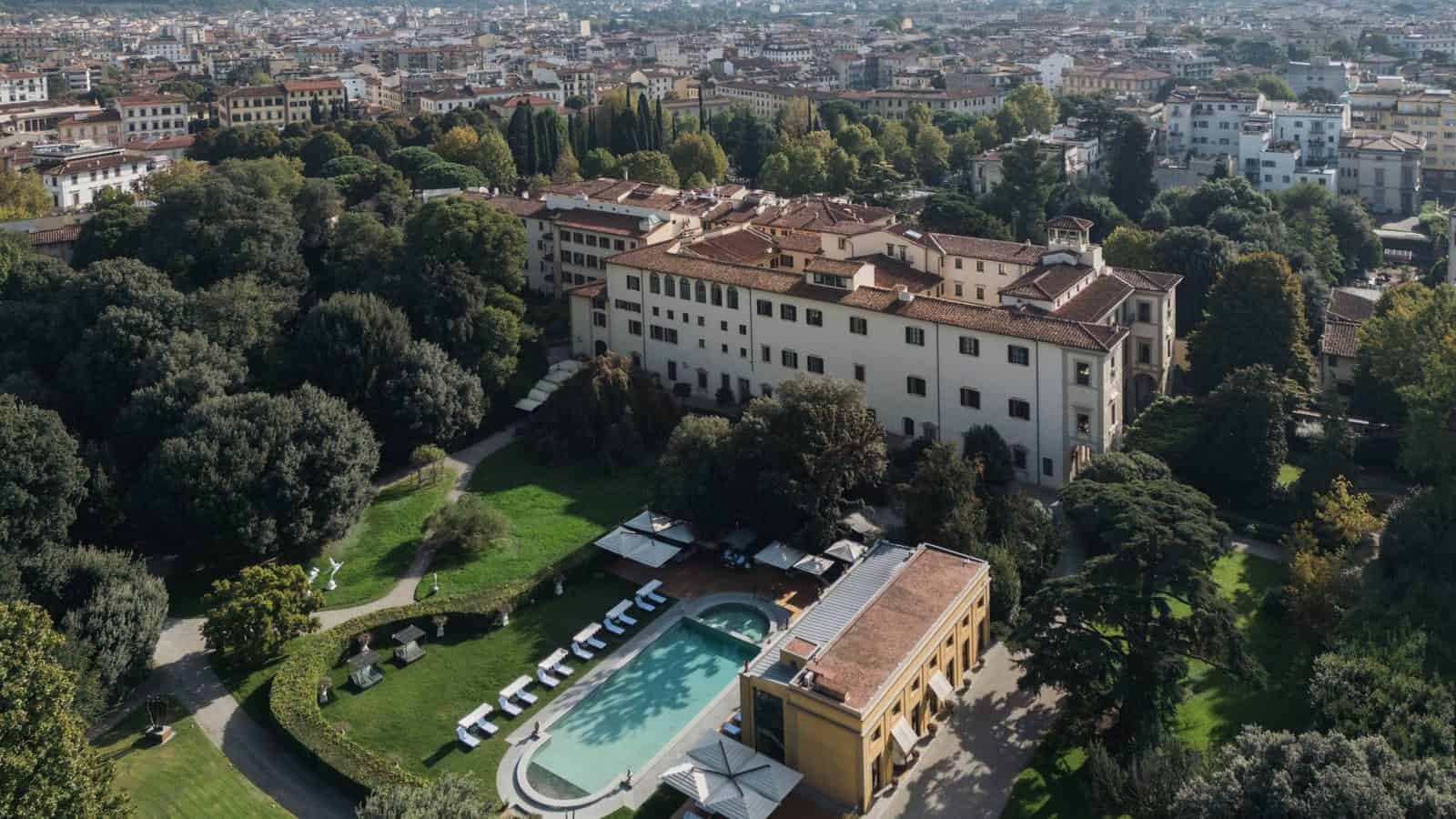 Four-seasons-hotel-firenze-florence-luxury-hotel-2026 - travel and tour world Four seasons hotel firenze with historic buildings, gardens and outdoor pool in florence