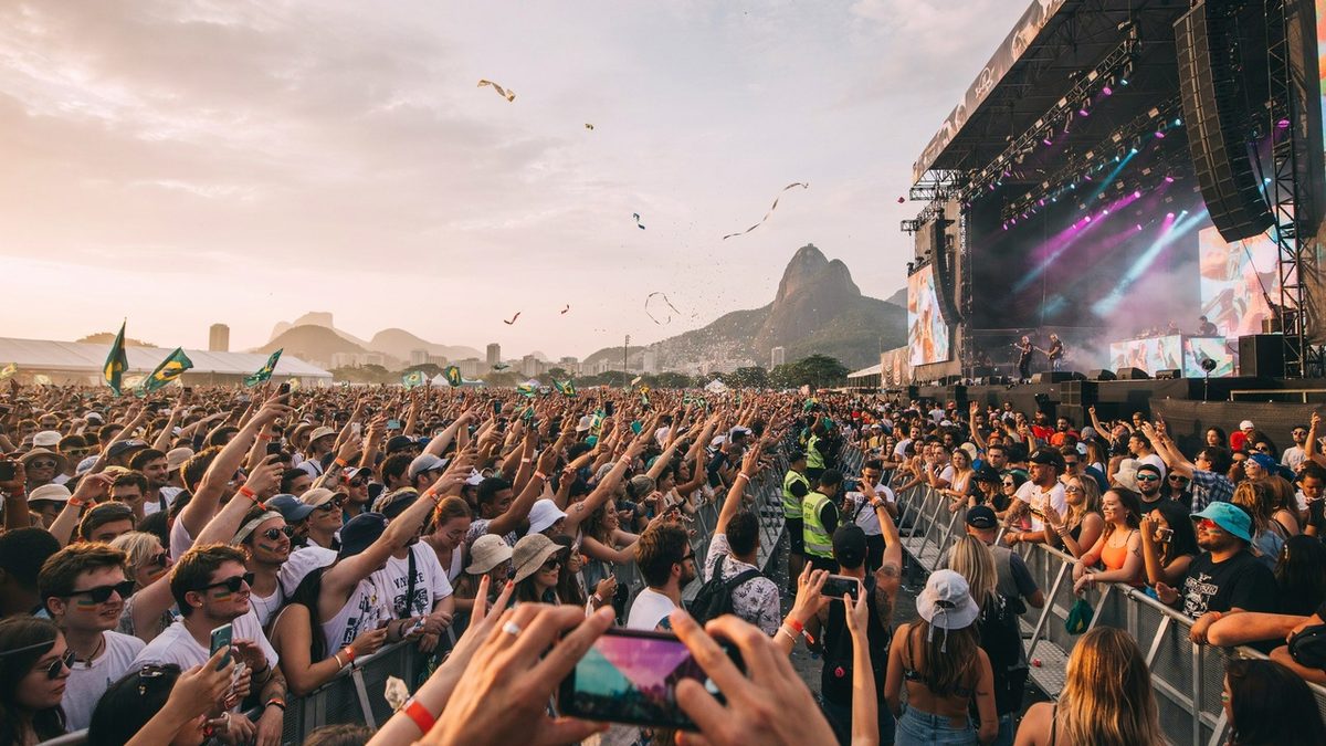 Crowd cheering at music festival