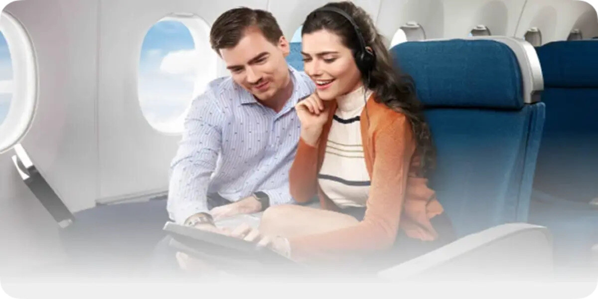 Vietnam airlines passengers enjoying digital inflight travel experience