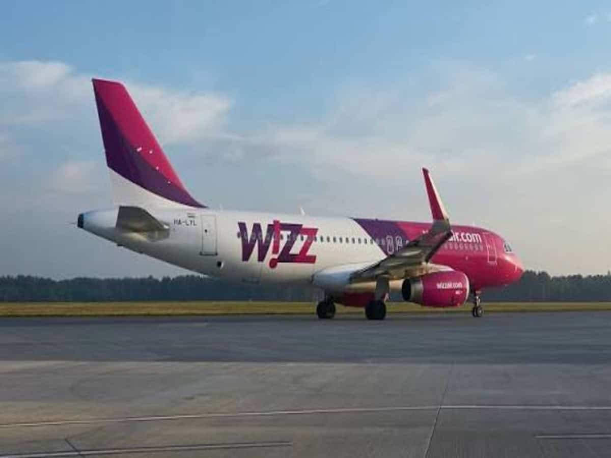 Wizz air aircraft arriving at larnaca airport celebrating the launch of a new direct flight route between cyprus and madrid