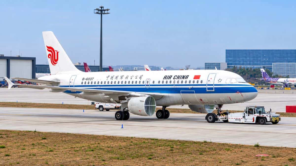 Air china jet on the tarmac - travel and tour world Air china airbus a330-300 aircraft representing increased passenger capacity on the beijing capital to minsk route between china and belarus in late october and early november 2026.