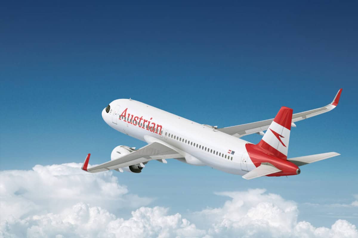 Austrian airlines - travel and tour world Austrian airlines flying in the blue sky