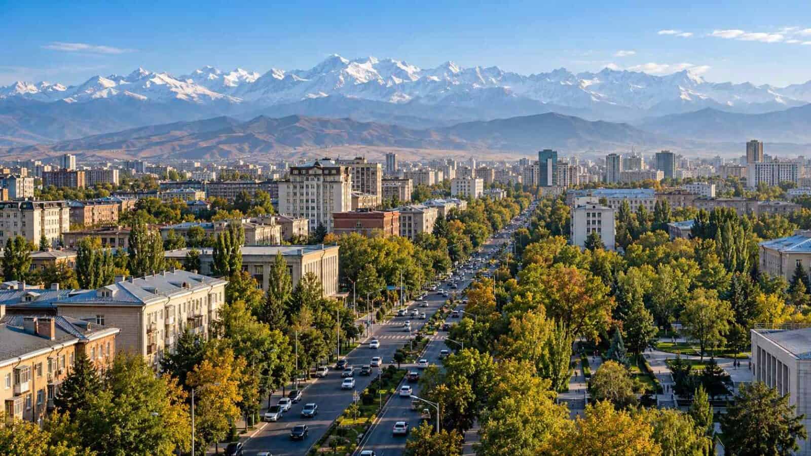Uk travel - travel and tour world Bishkek skyline and tian shan mountains illustrating skyscanner’s uk travel hotspots selection.