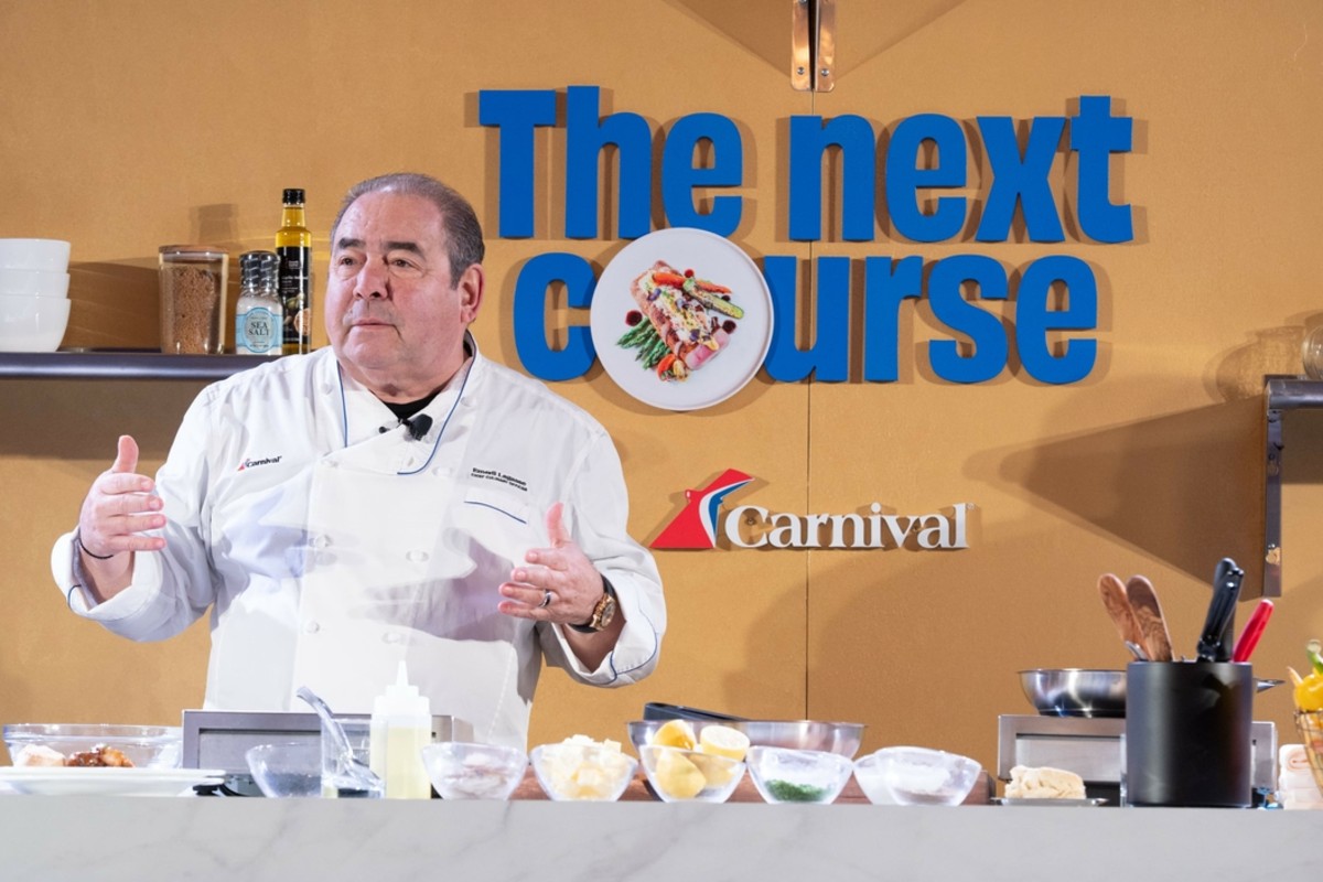 Carnival cruise line - travel and tour world Carnival cruise line chief culinary officer emeril lagasse presents a live cooking demonstration for the next course culinary programme, showcasing new dining experiences at sea.
