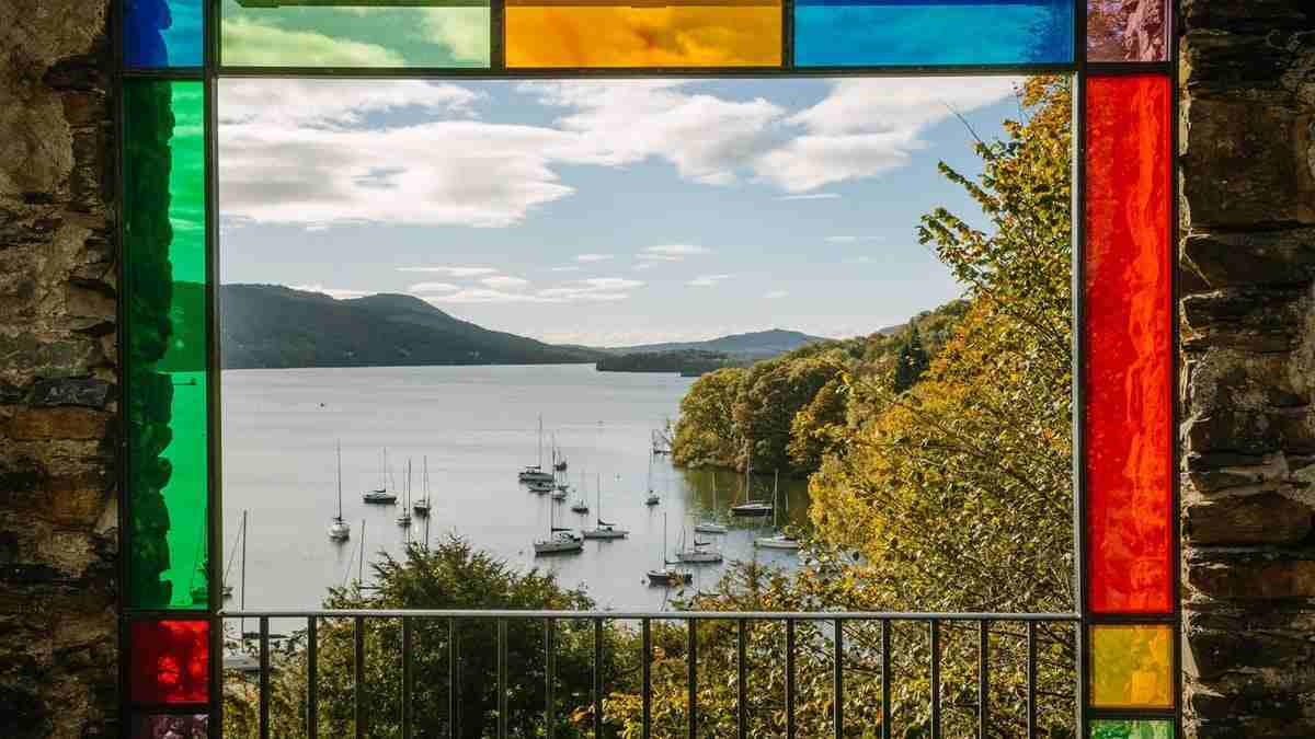 England tourism - travel and tour world Scenic lake windermere in england’s lake district, featuring peaceful lakeside views, woodland trails and quietcation travel escapes.