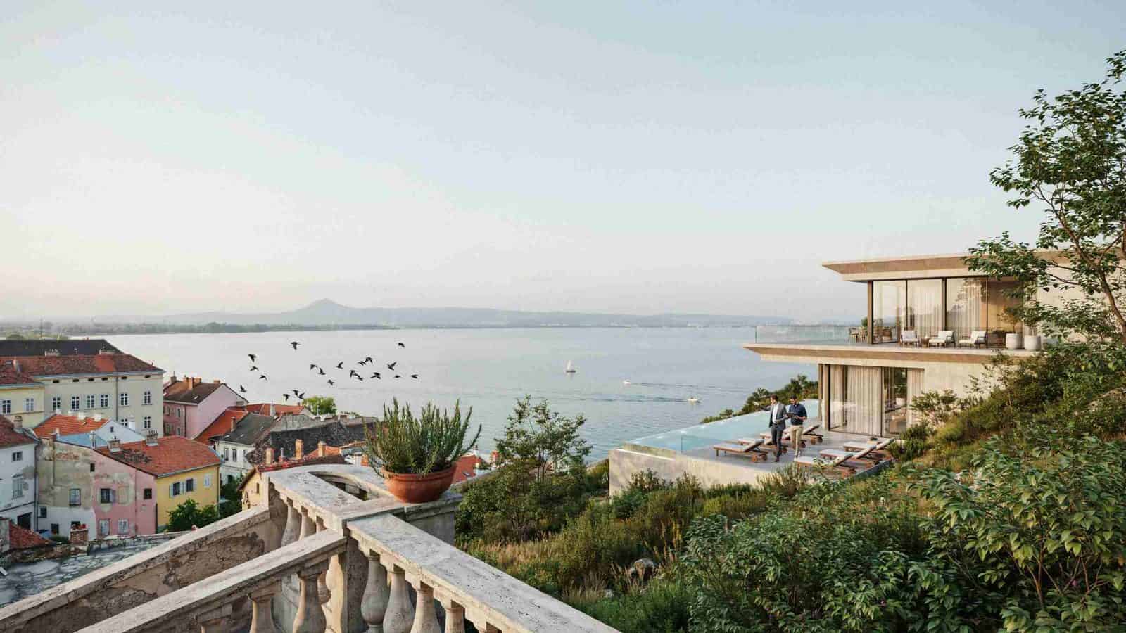 Hungary tourism - travel and tour world Lake balaton tourism in hungary with luxury lakeside development, sailing and scenic waterfront views.