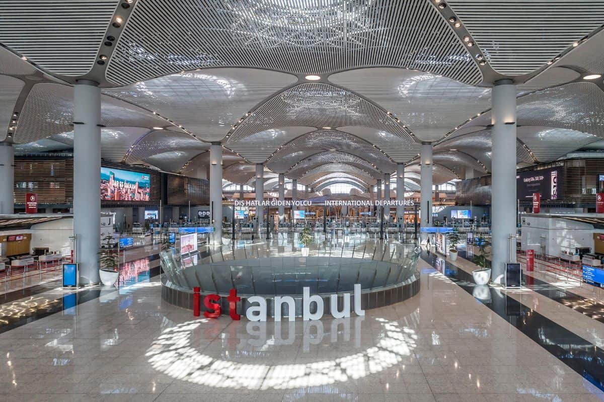 Istanbul airport - travel and tour world Istanbul airport’s modern international departures terminal featuring a sweeping futuristic ceiling, spacious interiors and polished floors.