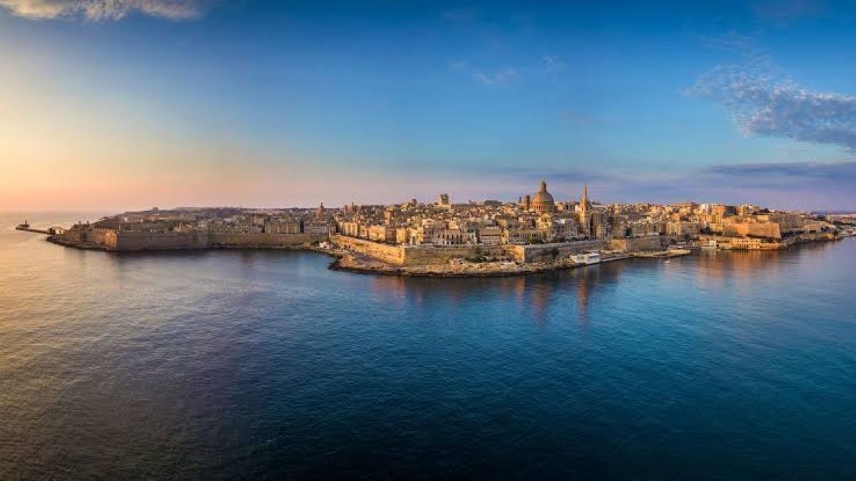 Malta - travel and tour world Valletta, malta, historic waterfront skyline overlooking the mediterranean sea at sunset