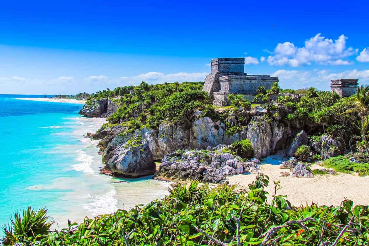 Tulum mayan ruins overlooking turquoise caribbean waters in mexico.