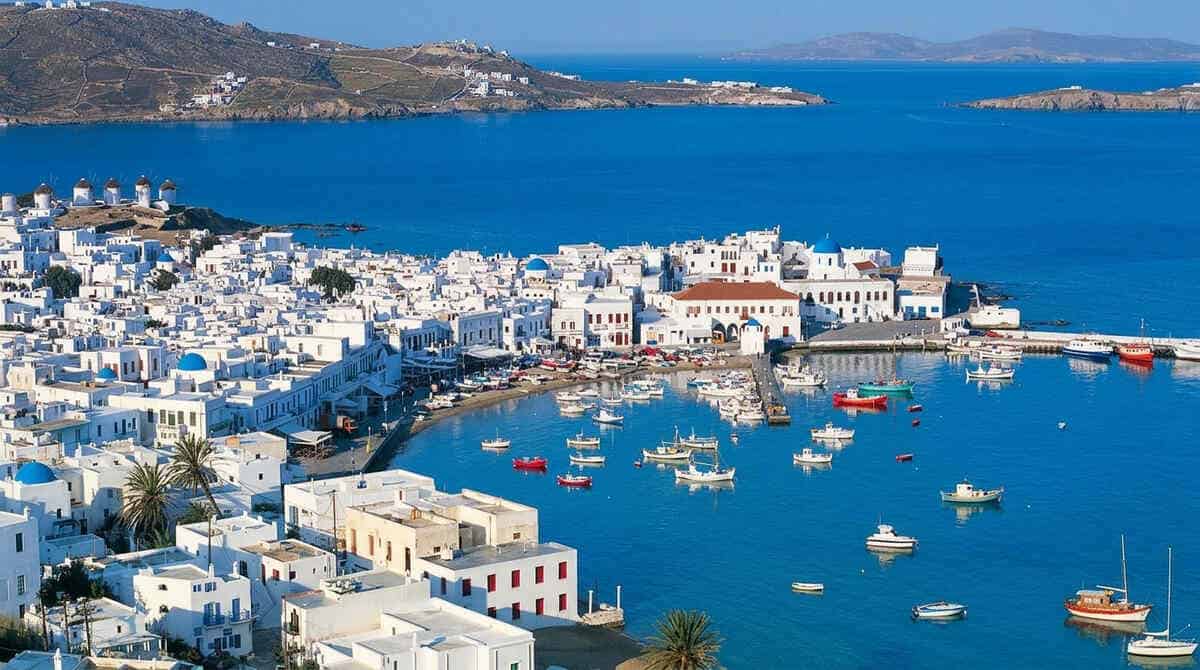 Mykonos tourism - travel and tour world Mykonos luxury tourism in greece with rising air arrivals and high-end holiday rentals.