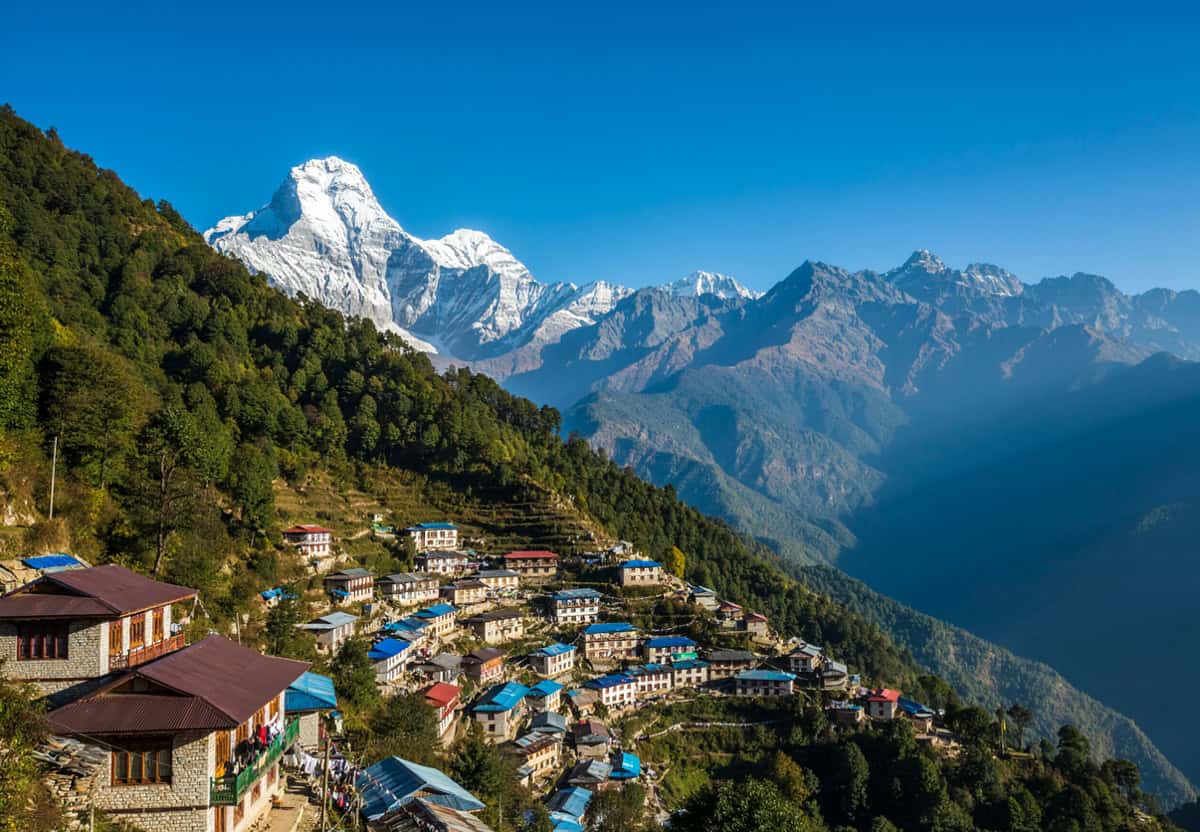 Nepal - travel and tour world Majestic kanchenjunga mountain peaks in nepal attract international trekkers during autumn.