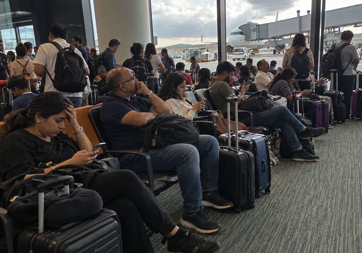 Passengers waiting at airport - travel and tour world Passengers waiting at airport